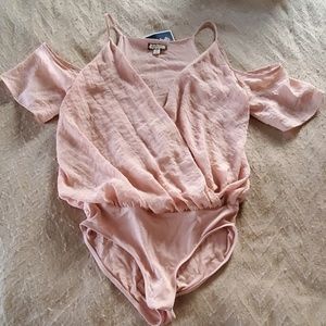 Light pink body suit